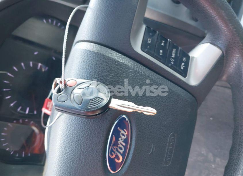 Photo 11 of 2011 Ford Fusion SE (VIN 3FAHP0HA9BR244203)