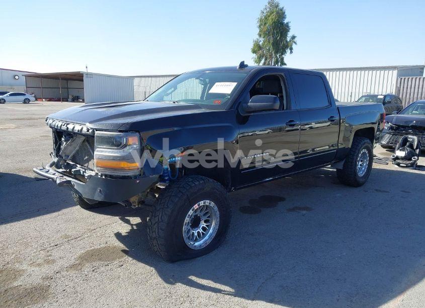 Photo 2 of 2016 Chevrolet Silverado 1500 1LT (VIN 3GCPCREC8GG310657)