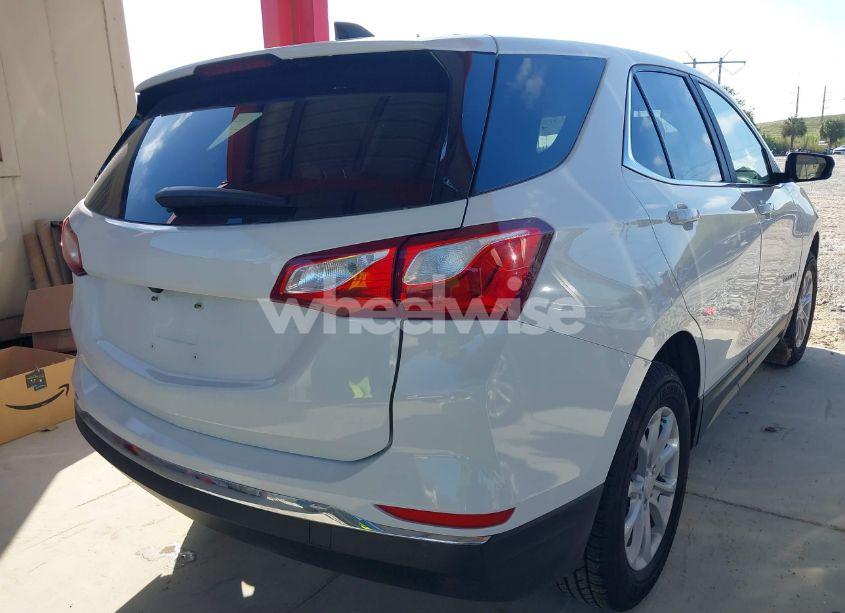 Photo 4 of 2021 Chevrolet Equinox AWD LT (VIN 3GNAXUEV4MS128954)