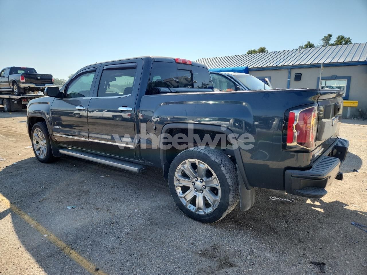 Photo 2 of 2017 GMC SIERRA K1500 DENALI (VIN 3GTU2PEJ1HG446073)