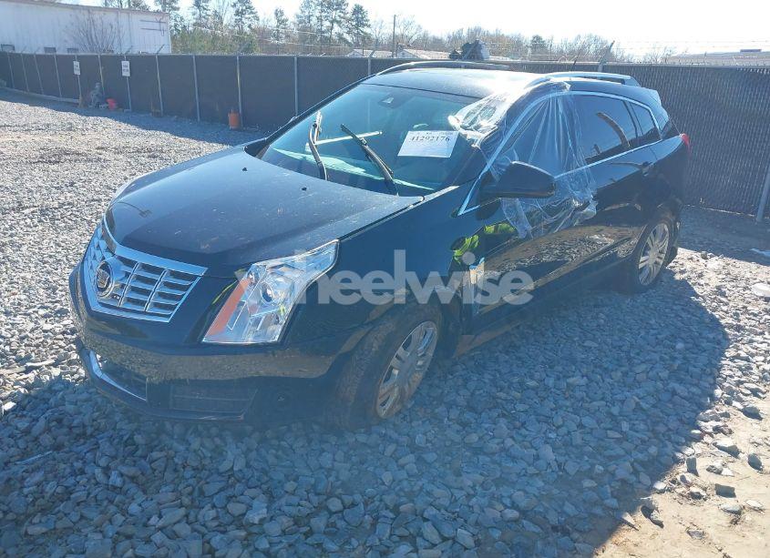 Photo 2 of 2014 Cadillac Srx LUXURY COLLECTION (VIN 3GYFNBE39ES521948)