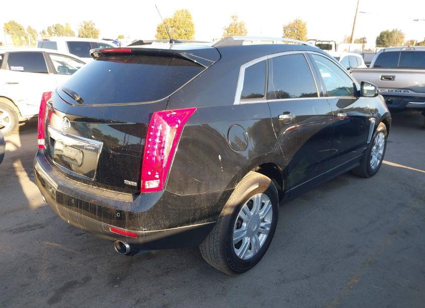 Photo 4 of 2014 Cadillac Srx LUXURY COLLECTION (VIN 3GYFNBE39ES549734)