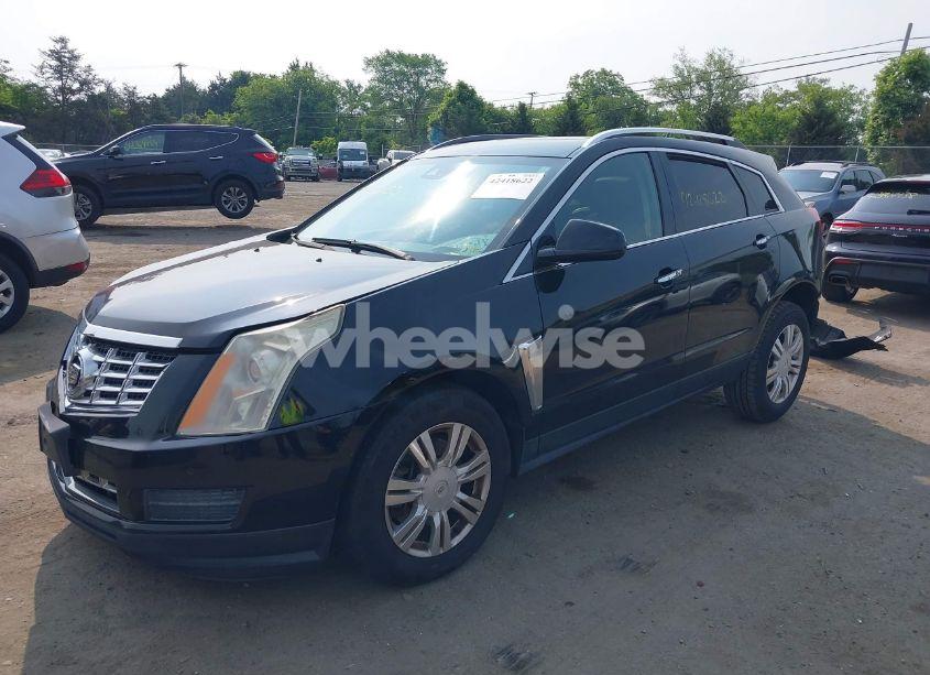 Photo 2 of 2014 Cadillac Srx LUXURY COLLECTION (VIN 3GYFNBE3XES656923)