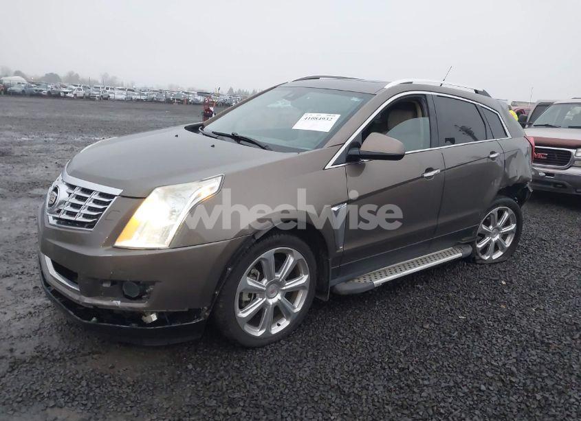 Photo 2 of 2014 Cadillac Srx PERFORMANCE COLLECTION (VIN 3GYFNCE30ES635570)
