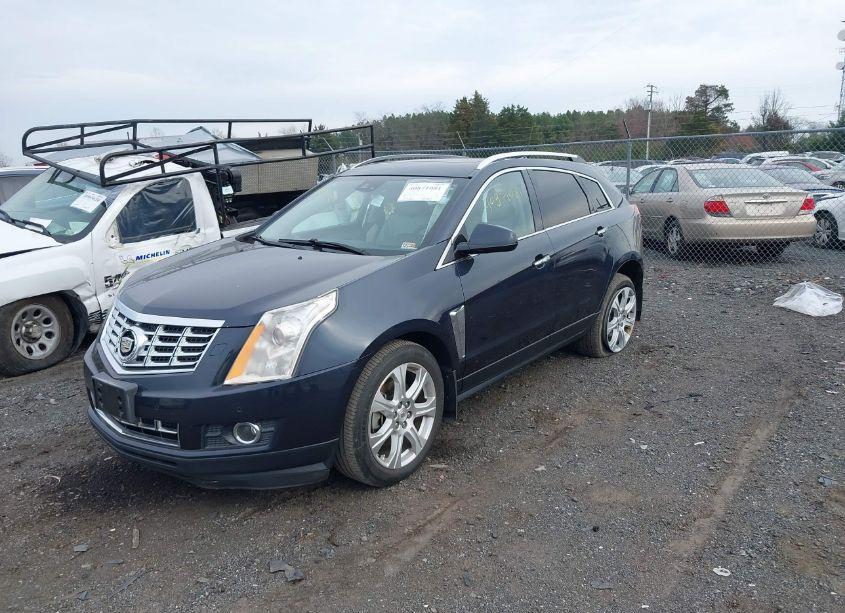 Photo 2 of 2014 Cadillac Srx PERFORMANCE COLLECTION (VIN 3GYFNCE33ES582802)