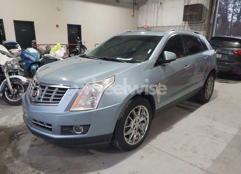 Photo 2 of 2014 Cadillac Srx PERFORMANCE COLLECTION (VIN 3GYFNCE38ES588093)