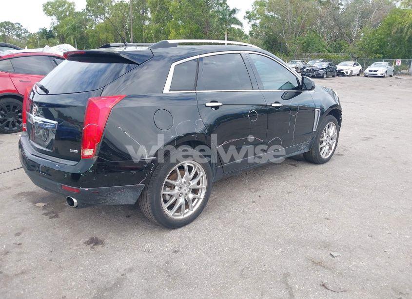 Photo 4 of 2014 Cadillac Srx PREMIUM COLLECTION (VIN 3GYFNDE33ES681741)