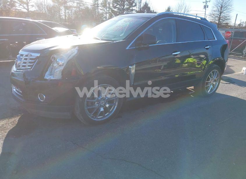 Photo 2 of 2013 Cadillac Srx PERFORMANCE COLLECTION (VIN 3GYFNDE39DS558993)