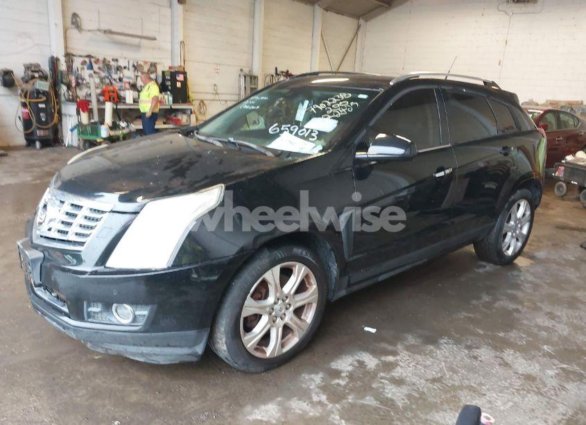 Photo 2 of 2014 Cadillac Srx PERFORMANCE COLLECTION (VIN 3GYFNFE39ES659013)
