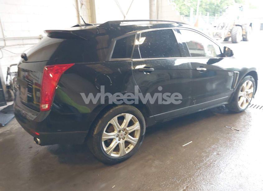 Photo 4 of 2014 Cadillac Srx PERFORMANCE COLLECTION (VIN 3GYFNFE39ES659013)