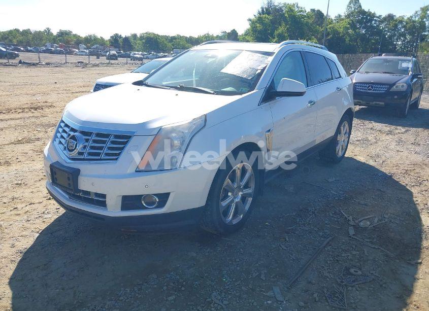 Photo 2 of 2013 Cadillac Srx PERFORMANCE COLLECTION (VIN 3GYFNHE31DS597987)