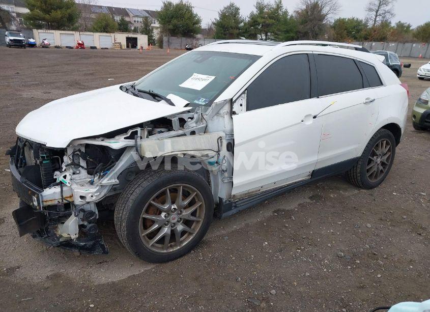 Photo 2 of 2013 Cadillac Srx PERFORMANCE COLLECTION (VIN 3GYFNHE34DS655073)