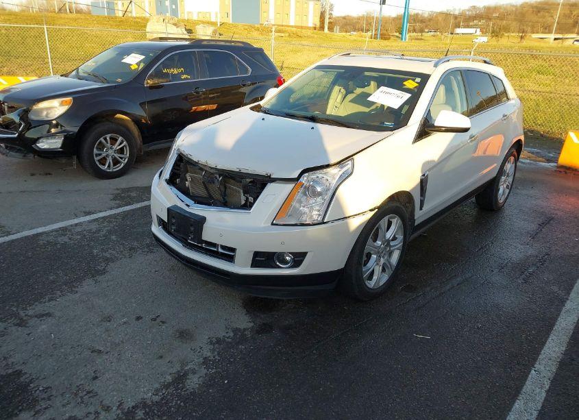 Photo 2 of 2013 Cadillac Srx PREMIUM COLLECTION (VIN 3GYFNJE33DS651829)