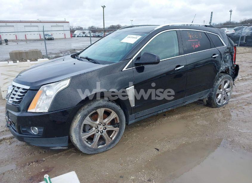 Photo 2 of 2013 Cadillac Srx PREMIUM COLLECTION (VIN 3GYFNJE33DS654679)