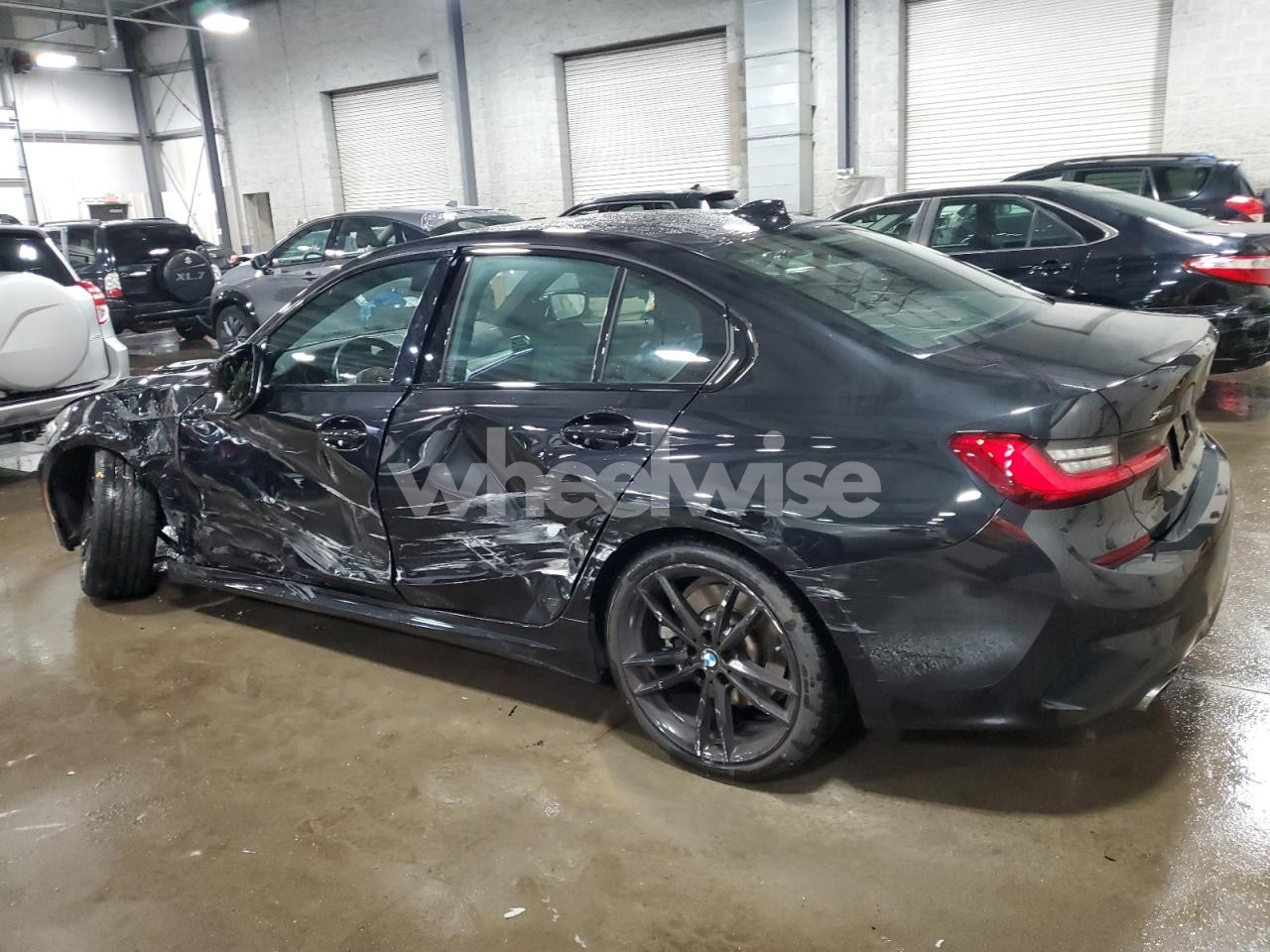 Photo 2 of 2020 BMW 330XI (VIN 3MW5R7J03L8B44829)