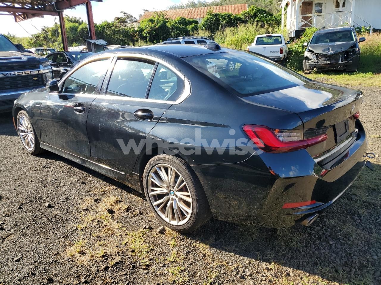 Photo 2 of 2024 BMW 330I (VIN 3MW69FF04R8E40023)