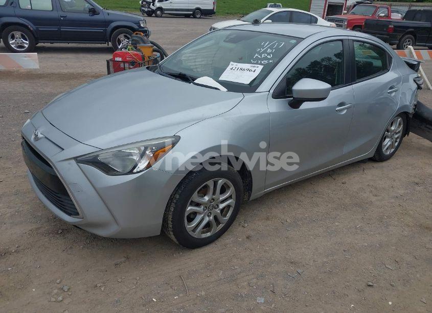 Photo 2 of 2017 Toyota Yaris IA (VIN 3MYDLBYV0HY166400)