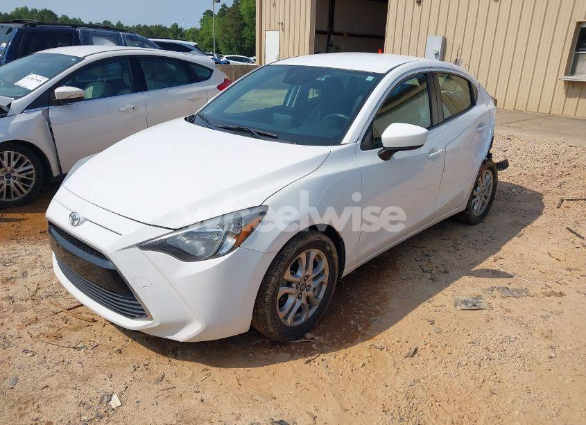 Photo 2 of 2017 Toyota Yaris IA (VIN 3MYDLBYV1HY158919)