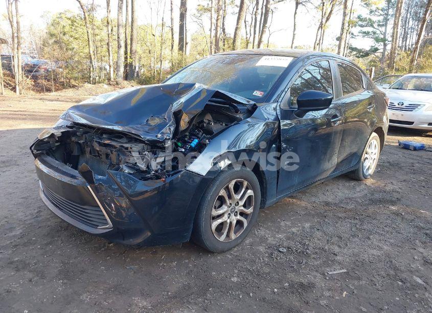 Photo 2 of 2017 Toyota Yaris IA (VIN 3MYDLBYV1HY185568)