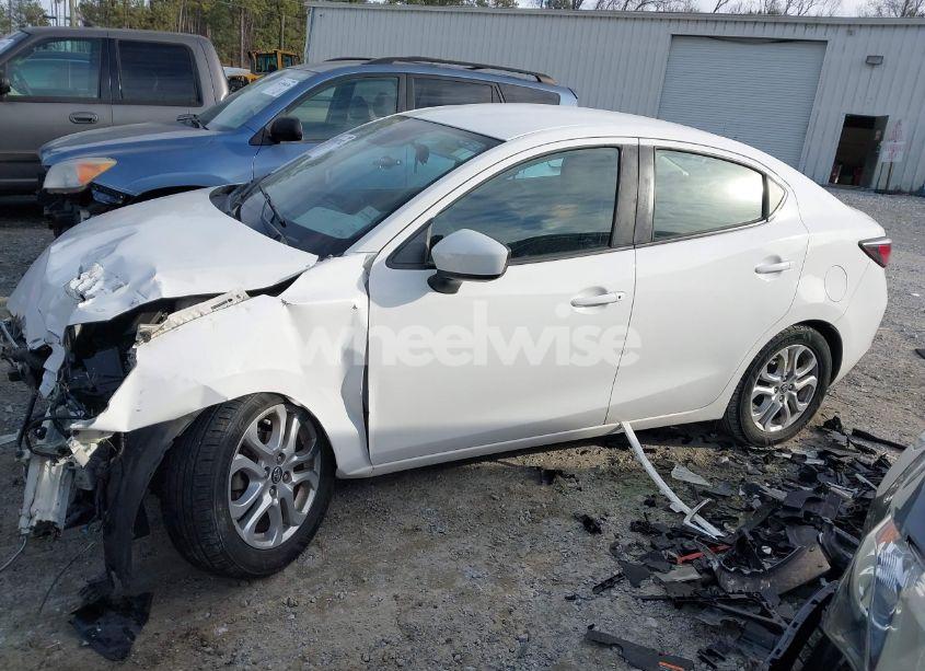 Photo 2 of 2017 Toyota Yaris IA (VIN 3MYDLBYV1HY192780)