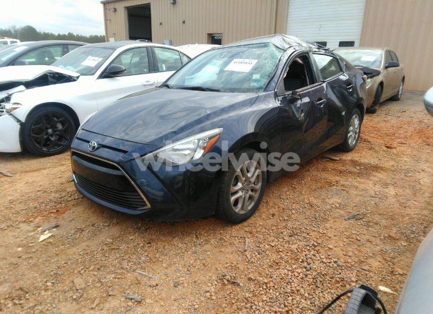 Photo 2 of 2017 Toyota Yaris IA (VIN 3MYDLBYV3HY191338)