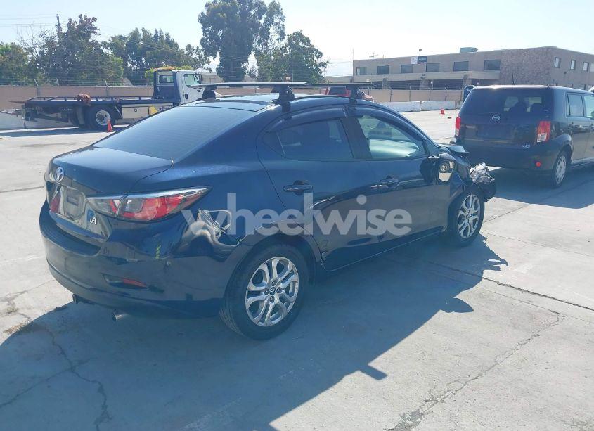 Photo 4 of 2017 Toyota Yaris IA (VIN 3MYDLBYV8HY160733)