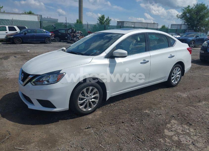 Photo 2 of 2018 Nissan Sentra SV (VIN 3N1AB7AP0JY257771)