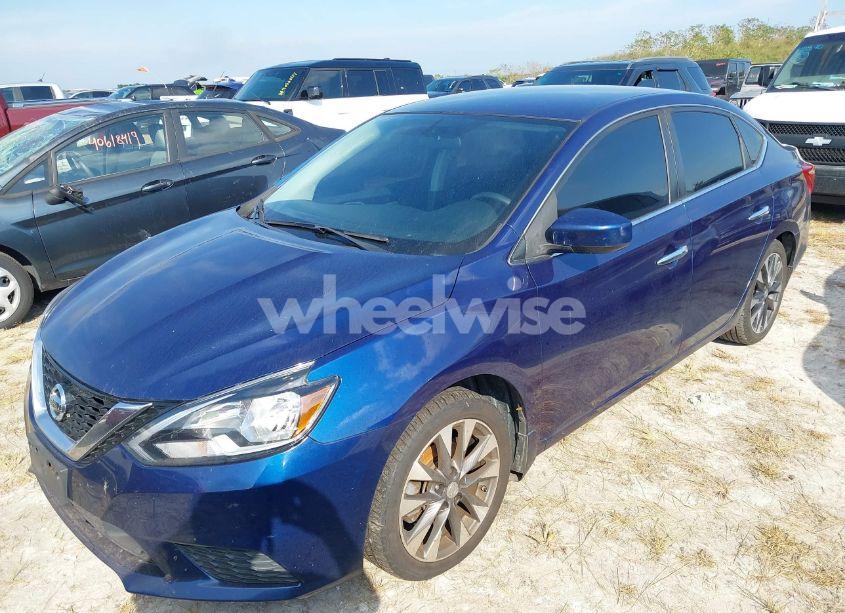 Photo 2 of 2018 Nissan Sentra SV (VIN 3N1AB7AP1JL658579)