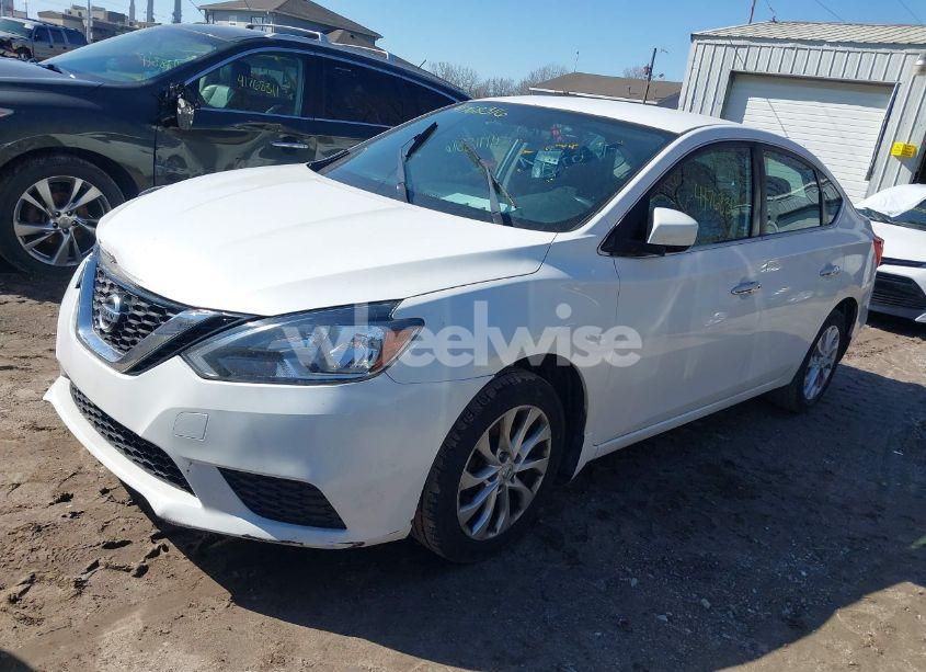 Photo 2 of 2017 Nissan Sentra SV (VIN 3N1AB7AP3HL717075)