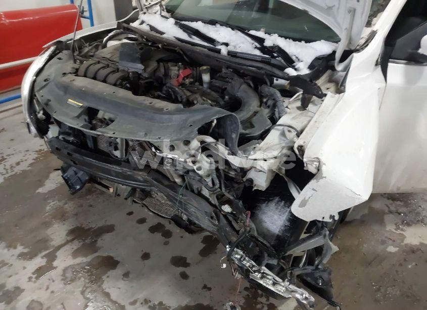 Photo 6 of 2014 Nissan Sentra FE+ S/FE+ SV/S/SL/SR/SV (VIN 3N1AB7AP4EL652913)