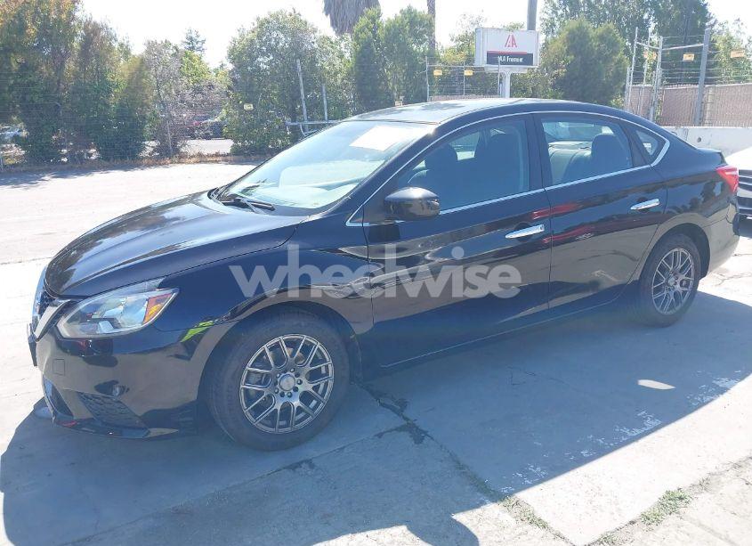 Photo 2 of 2018 Nissan Sentra S (VIN 3N1AB7AP4JY305904)
