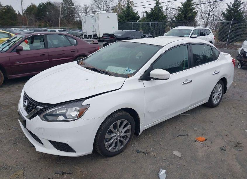 Photo 2 of 2018 Nissan Sentra SV (VIN 3N1AB7AP5JY299904)