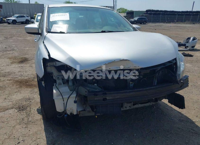 Photo 6 of 2014 Nissan Sentra FE+ S/FE+ SV/S/SL/SR/SV (VIN 3N1AB7AP6EL670670)