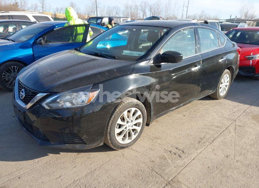 Photo 2 of 2018 Nissan Sentra SV (VIN 3N1AB7AP8JY220452)