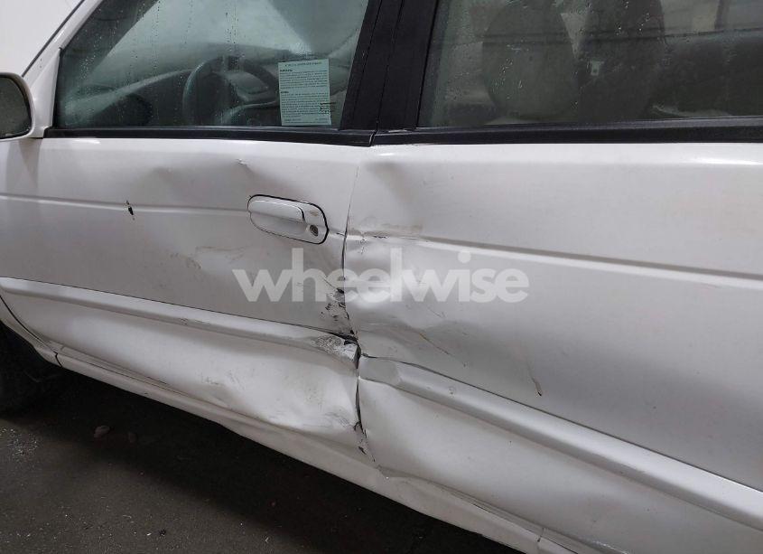 Photo 6 of 2004 Nissan Sentra 1.8S (VIN 3N1CB51D64L909944)