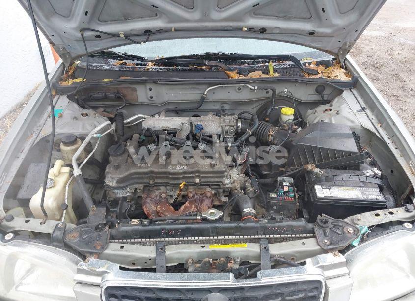 Photo 10 of 2003 Nissan Sentra XE (VIN 3N1CB51DX3L803821)