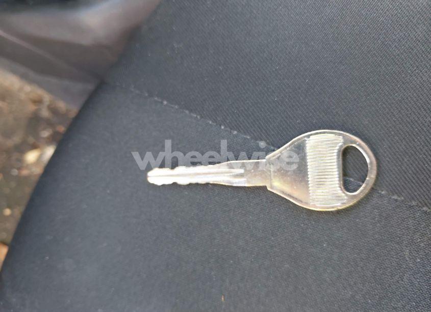 Photo 11 of 2015 Nissan Versa 1.6 S (VIN 3N1CN7AP7FL934089)