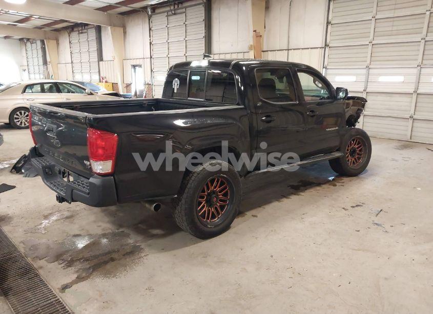 Photo 4 of 2016 Toyota Tacoma SR5 V6 (VIN 3TMAZ5CN0GM013952)