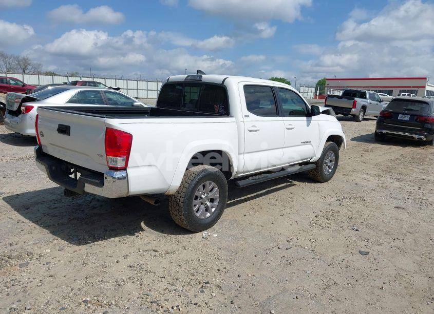 Photo 4 of 2017 Toyota Tacoma SR5 V6 (VIN 3TMAZ5CN8HM045727)