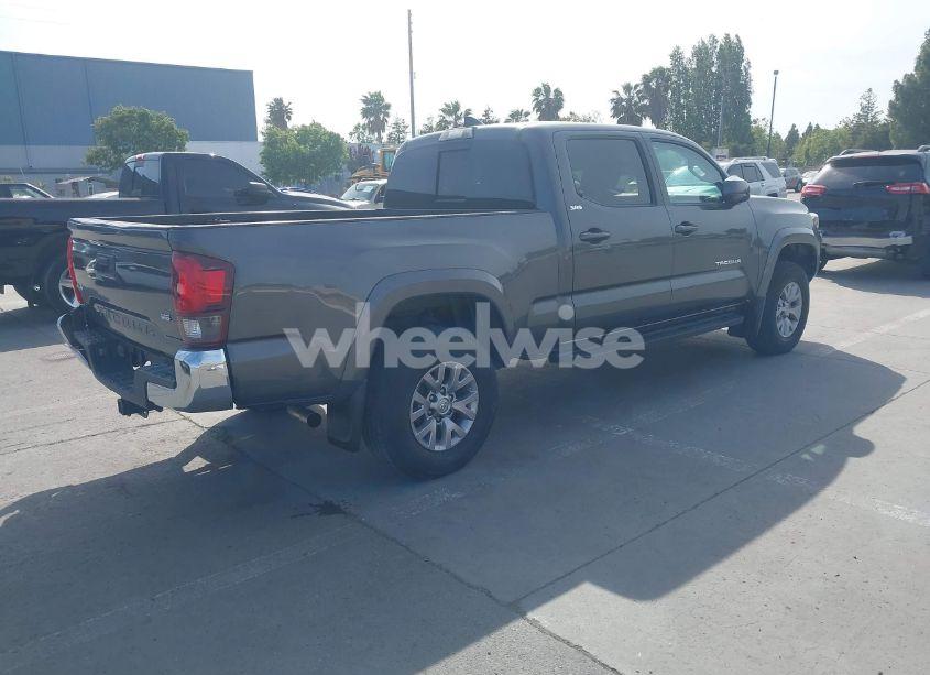 Photo 4 of 2018 Toyota Tacoma SR5 V6 (VIN 3TMDZ5BN7JM041754)