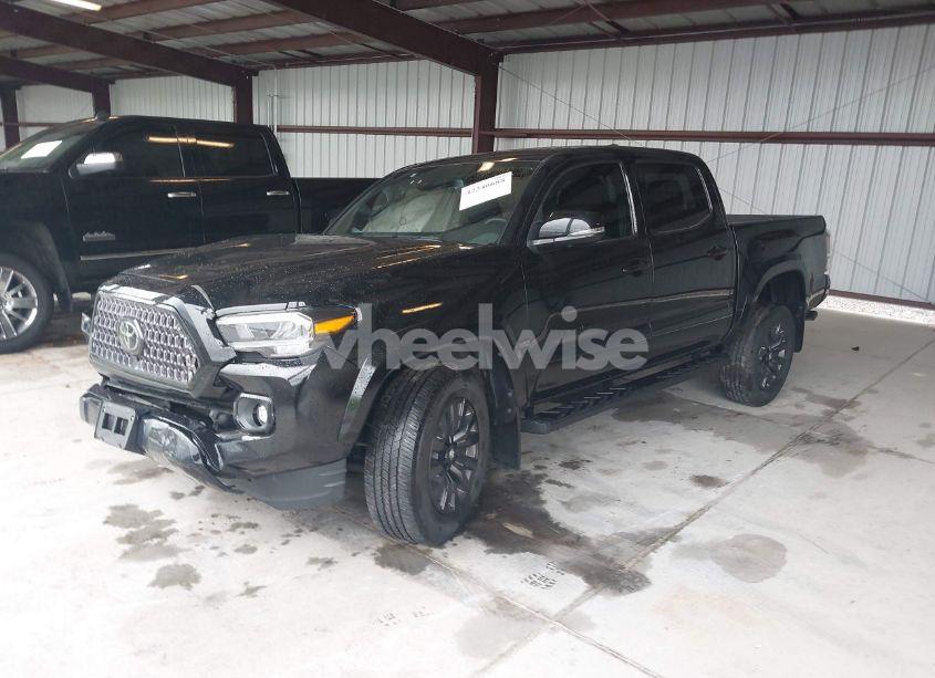 Photo 2 of 2022 Toyota Tacoma LIMITED (VIN 3TMGZ5AN2NM477660)