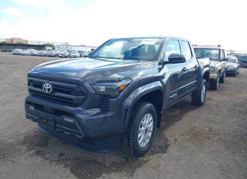 Photo 2 of 2024 Toyota Tacoma SR5 (VIN 3TMKB5FN1RM004667)
