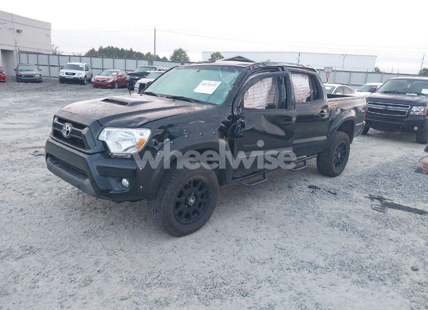 Photo 2 of 2013 Toyota Tacoma BASE V6 (VIN 3TMLU4EN4DM115748)