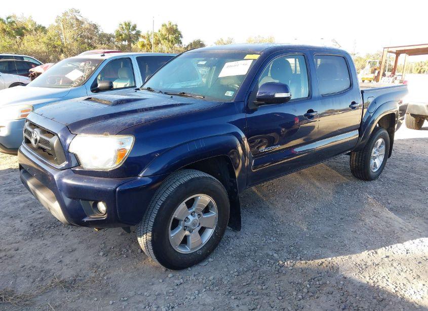 Photo 2 of 2013 Toyota Tacoma DOUBLE CAB (VIN 3TMLU4ENXDM127497)