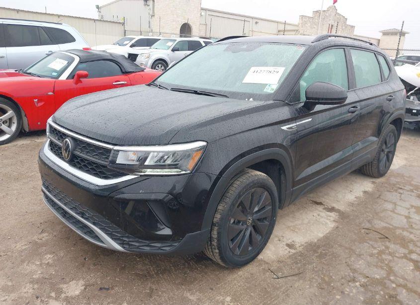 Photo 2 of 2024 Volkswagen Taos 1.5T S (VIN 3VV5X7B27RM022999)