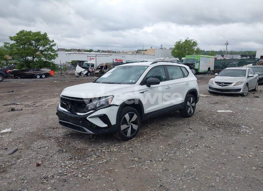 Photo 2 of 2024 Volkswagen Taos 1.5T S (VIN 3VV8X7B26RM069597)