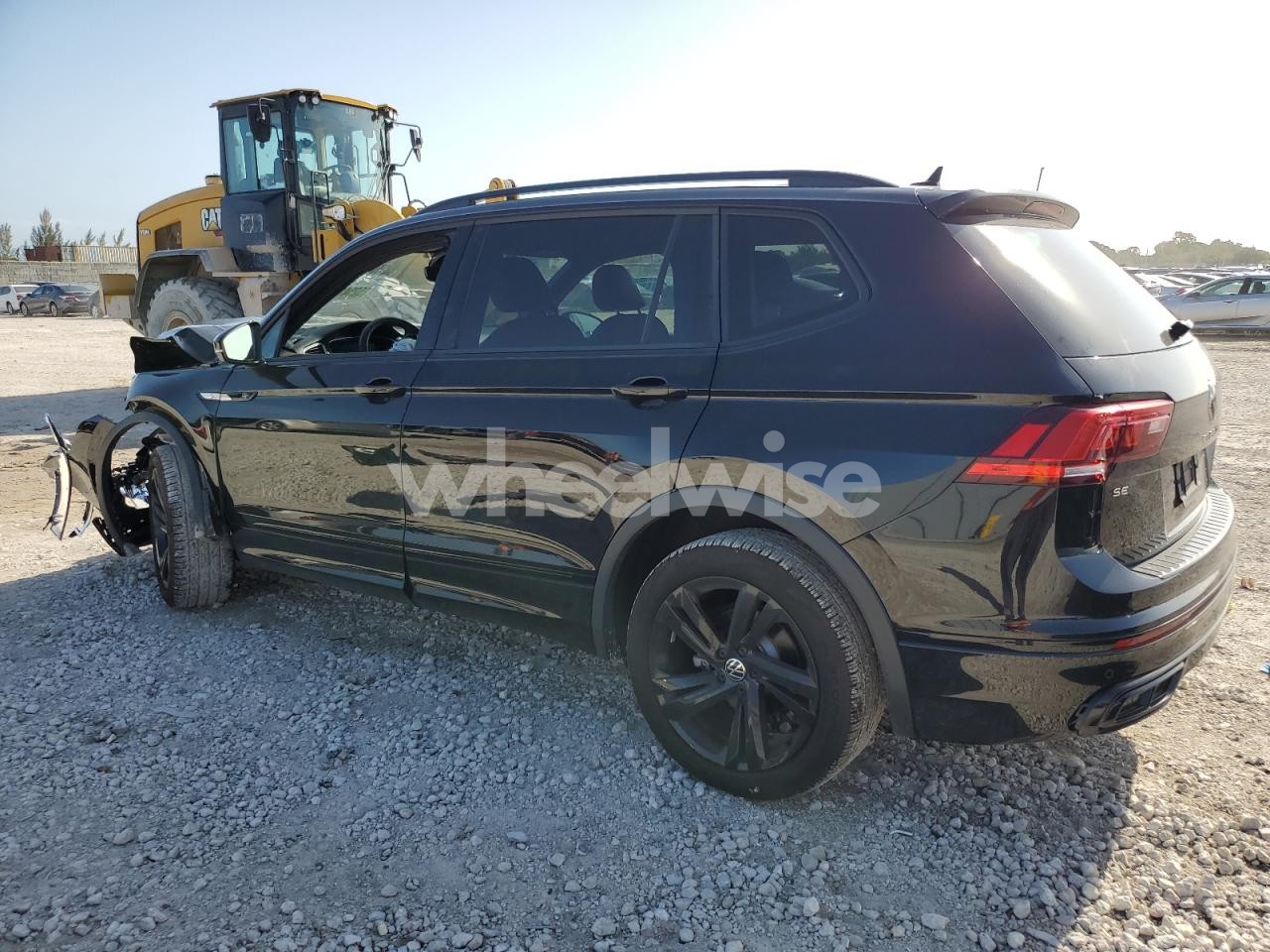 Photo 2 of 2024 VOLKSWAGEN TIGUAN SE R-LINE BLACK (VIN 3VVCB7AXXRM046734)