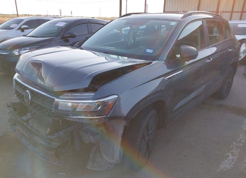 Photo 2 of 2022 Volkswagen Taos 1.5T S (VIN 3VVCX7B25NM050611)