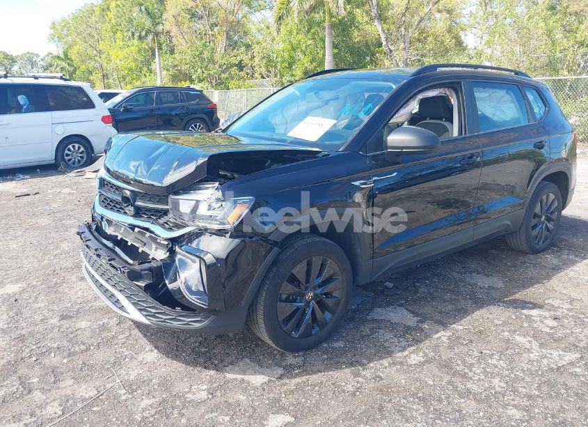 Photo 2 of 2022 Volkswagen Taos 1.5T S (VIN 3VVCX7B27NM006299)