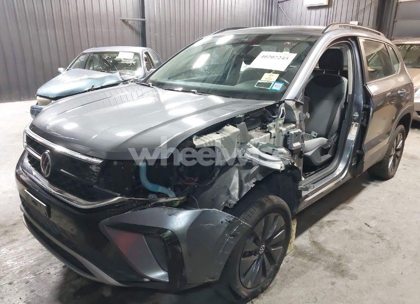 Photo 2 of 2022 Volkswagen Taos 1.5T S (VIN 3VVDX7B22NM003413)